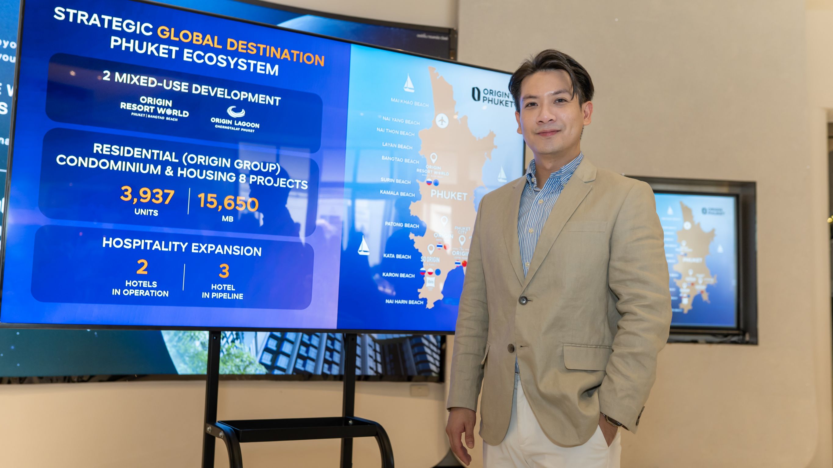 นายธนกร วุฒิพงษ์ ประธานเจ้าหน้าที่บริหาร สายงานการบริหารธุรกิจตลาดต่างประเทศ บริษัท ออริจิ้น พร็อพเพอร์ตี้ จำกัด (มหาชน)
