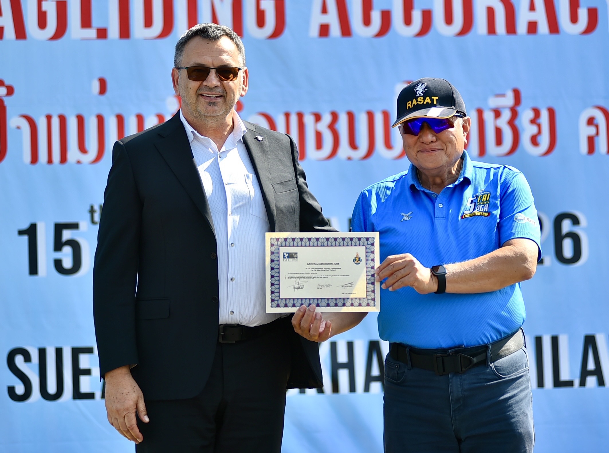 สมาคมกีฬาทางอากาศและการบินแห่งประเทศไทย ในพระบรมราชูปถัมภ์ จัดการแข่งขันร่มร่อนบินลงเป้าแม่นยำชิงแชมป์เอเชีย ครั้งที่ 5 ประจำปี 2569 5th Fai Asian Paragliding Accuracy Championship ณ สนามกีฬาทางอากาศชั่วคราวผาตากเสื้อ อำเภอสังคม จังหวัดหนองคาย ระหว่างวันที่ 7 – 15 กุมภาพันธ์ 2569